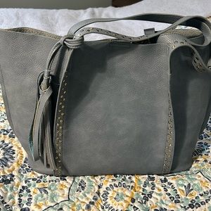 Light blue  over sized purse slight wear on bottom and inside.